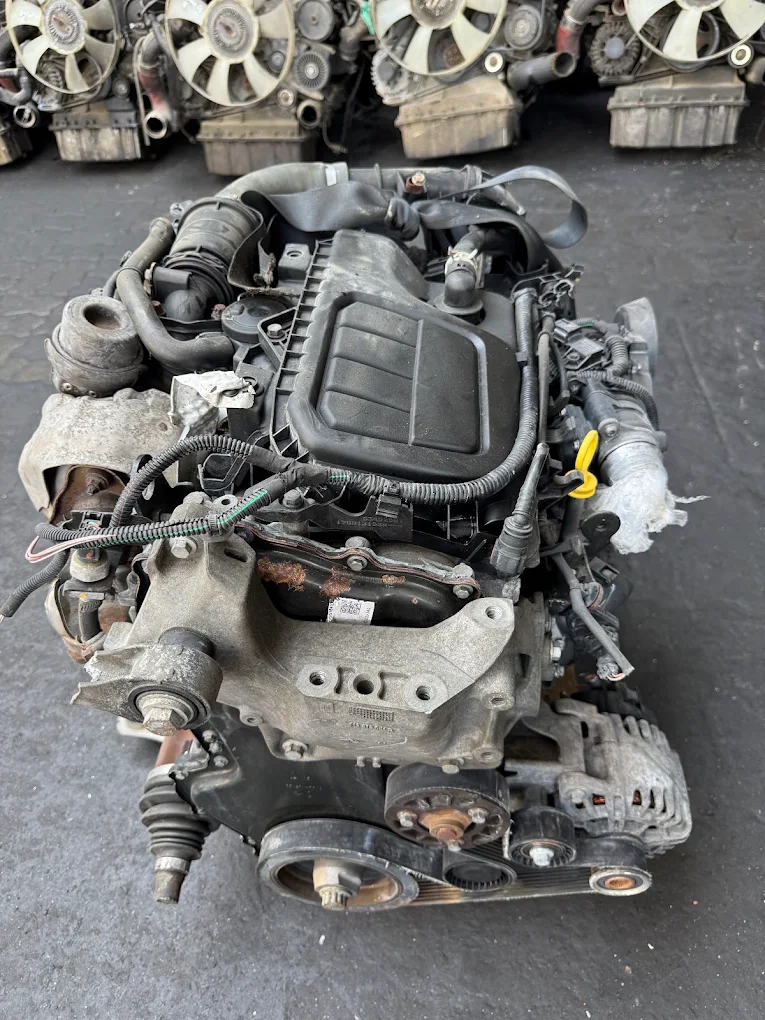 Complete salvaged engine and gearbox assembly